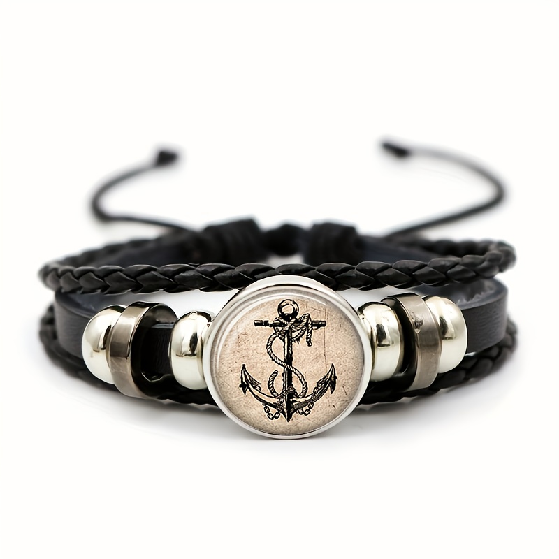 E-shop Eine Einzelpackung (Schwarzes synthetisches Kunstleder Herrenarmband), mit einem runden Abzeichen im Vintage-Ankerseil-Muster. Dieses nautische