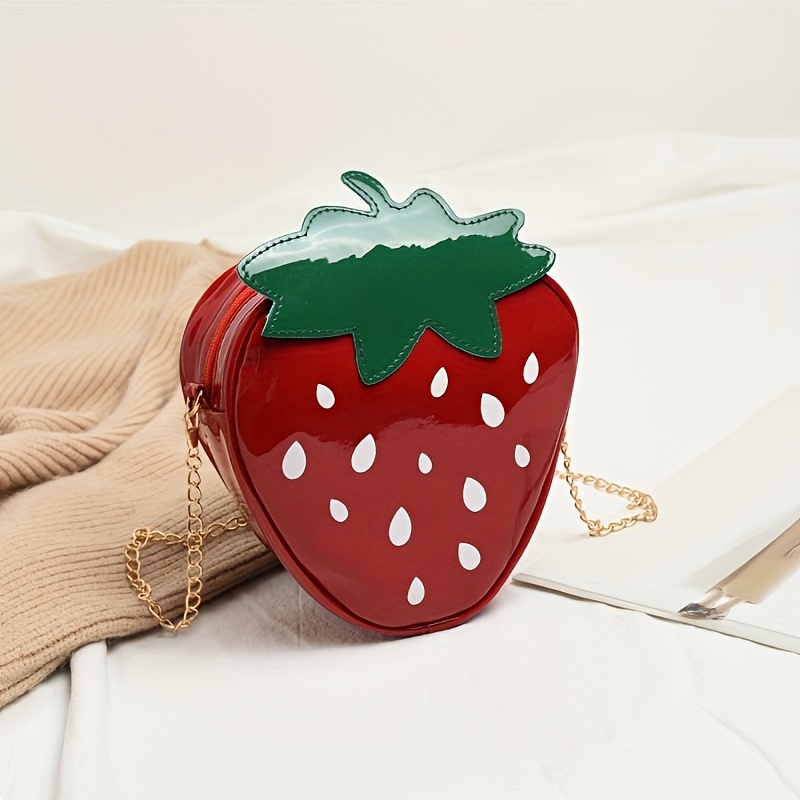 

's -shaped Chain Bag Made Of , A Creative Fruit-themed Shoulder Crossbody Bag For Young .