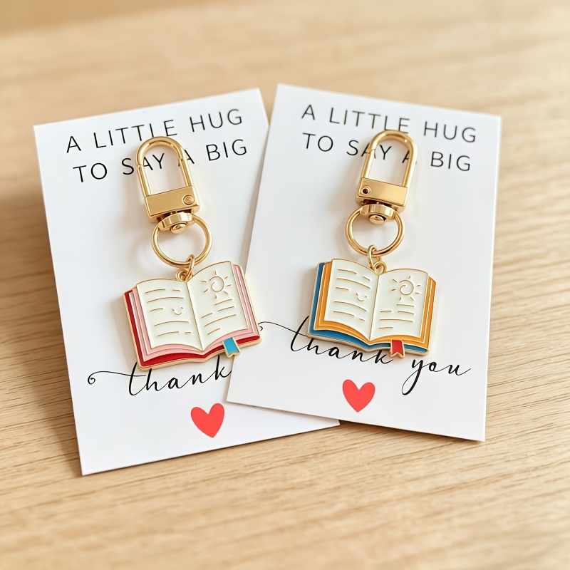 TEMU Colgante de llavero de libro pop-up de 1/2 piezas con tarjeta de acompañante, disponible en estilos artísticos con azul y . Un regalo para ,