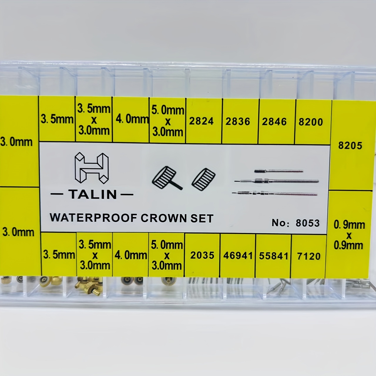 Image of Watch Additions In A Box With Models Of Watch Heads, Stems, And Crowns Mixed , Including Tools For Watch Crown Repair