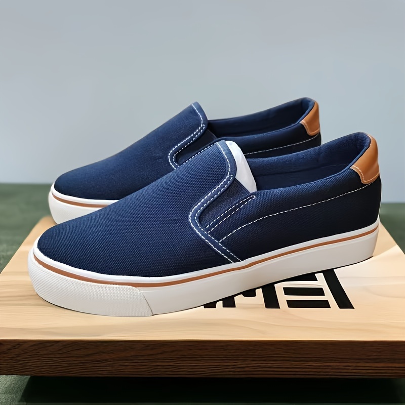 Womens navy canvas hotsell slip on shoes