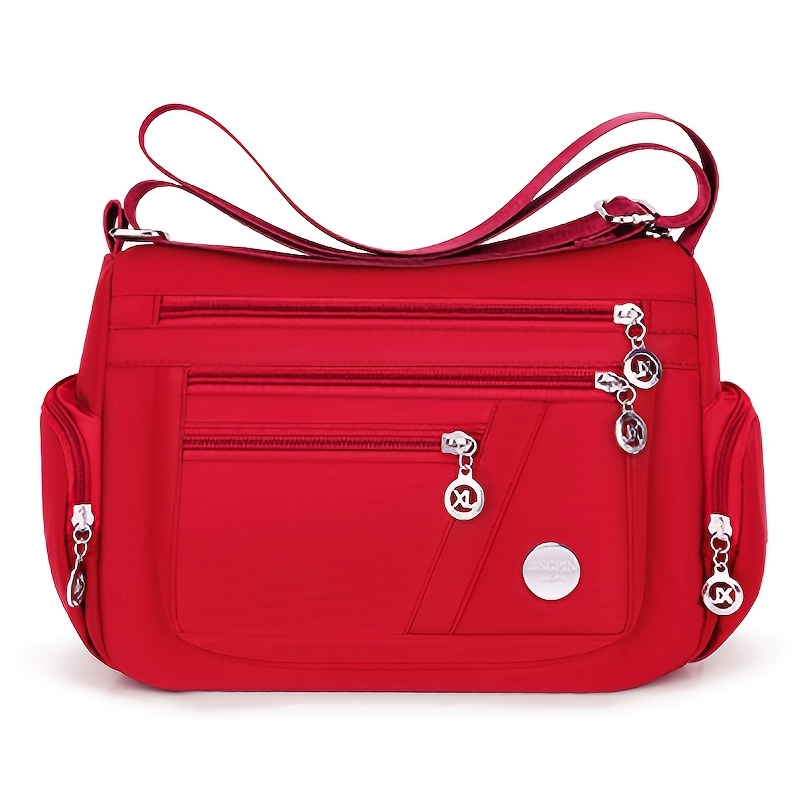 E-shop Unisex Quadratische Schultertasche mit mehreren Fächern, für Reisen und Freizeitaktivitäten. Die des Reißverschlussgriffs ist zufällig.