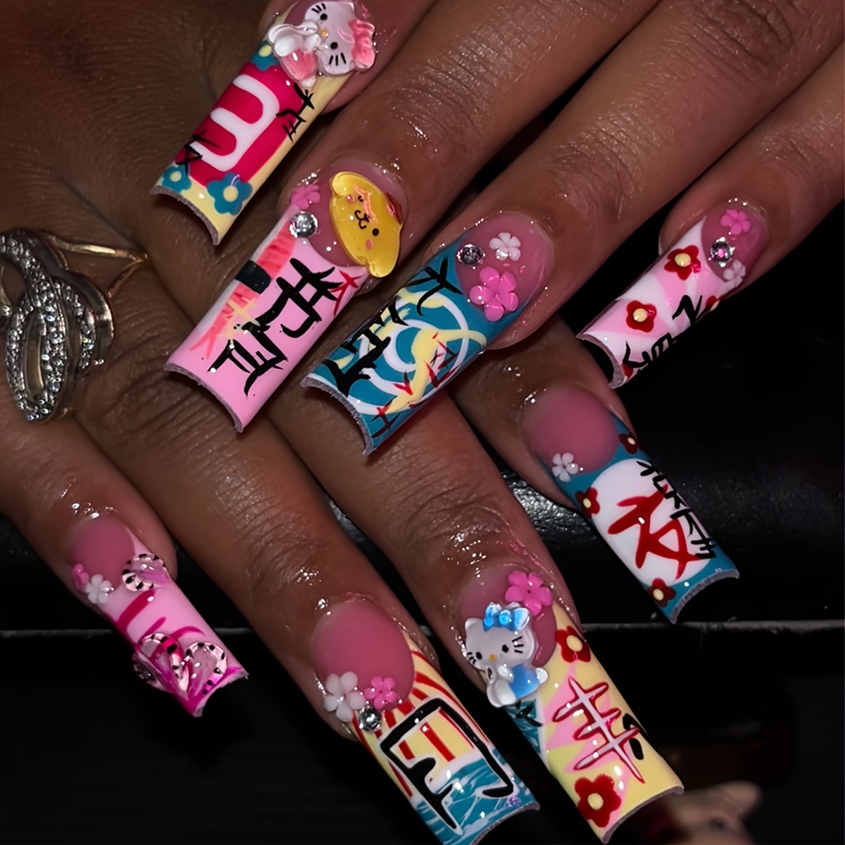 E-shop 24-teiliges kreatives Maniküre-Set mit langen Nagelstreifen, verziert mit niedlichen Elementen wie Hello Kitty, sowie Blumen, Mustern mit Text,