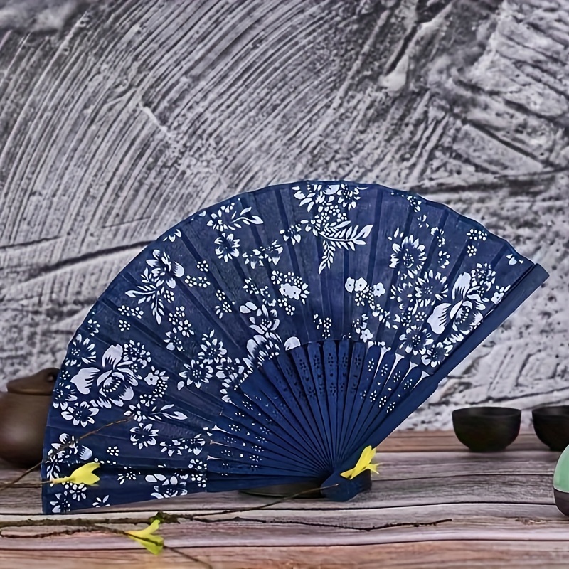 Image of 1pc Chinese Style Classical Women's Prop Fan, Holiday Gift, Ornamental Orchid Pattern With Hollowed-out Bamboo Slats