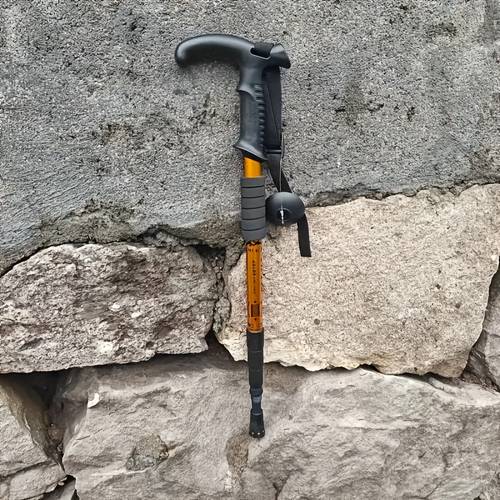 ultra lightweight adjustable hiking cane with ergonomic t shaped handle and shock absorbing system durable aluminum alloy comfortable grip suitable for hiking exploration