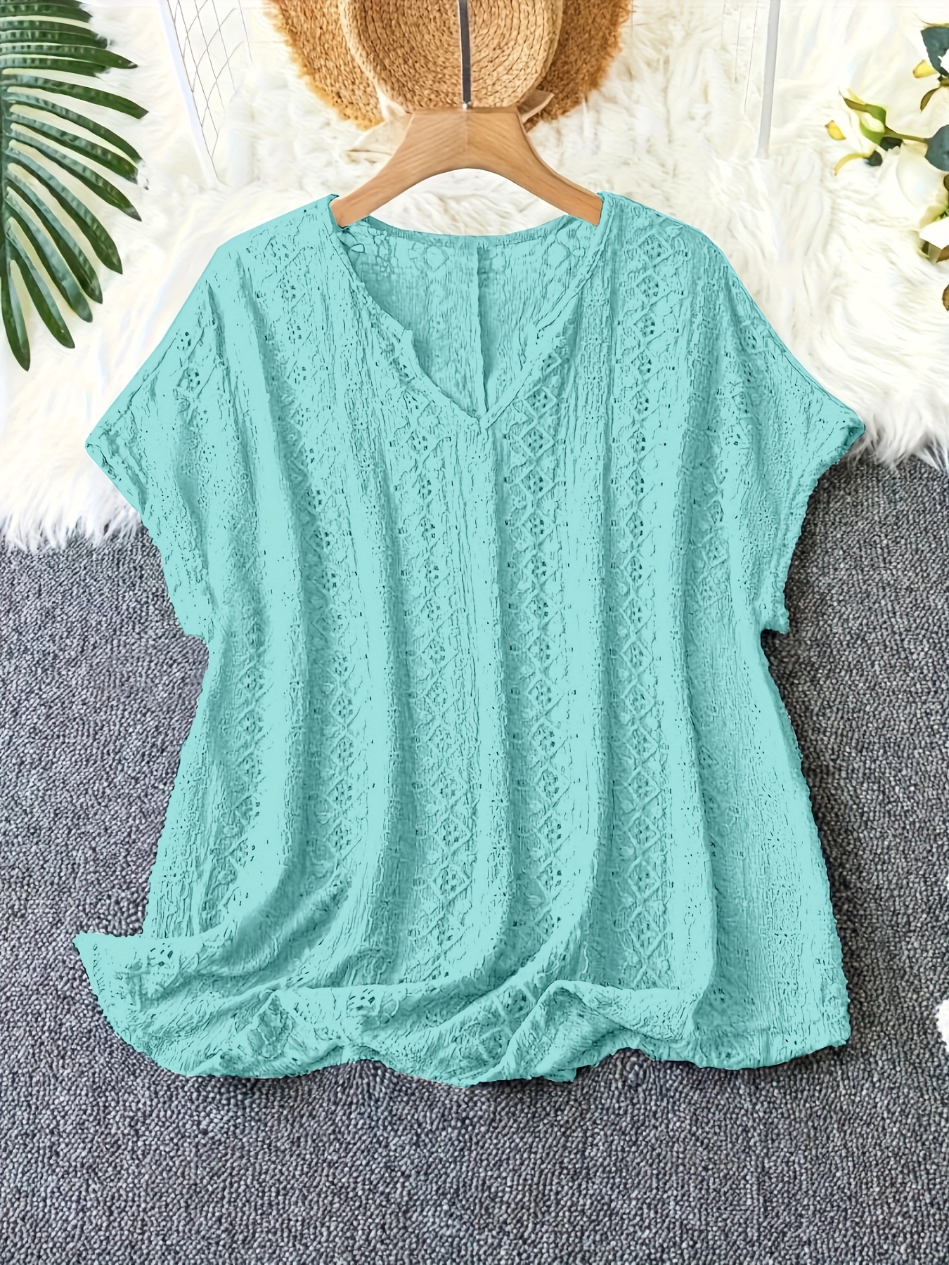 Plus-size summer hollowed-out V-neck bat-sleeve T-shirt for women. There are multiple color options available, and it features a hollowed-out design.