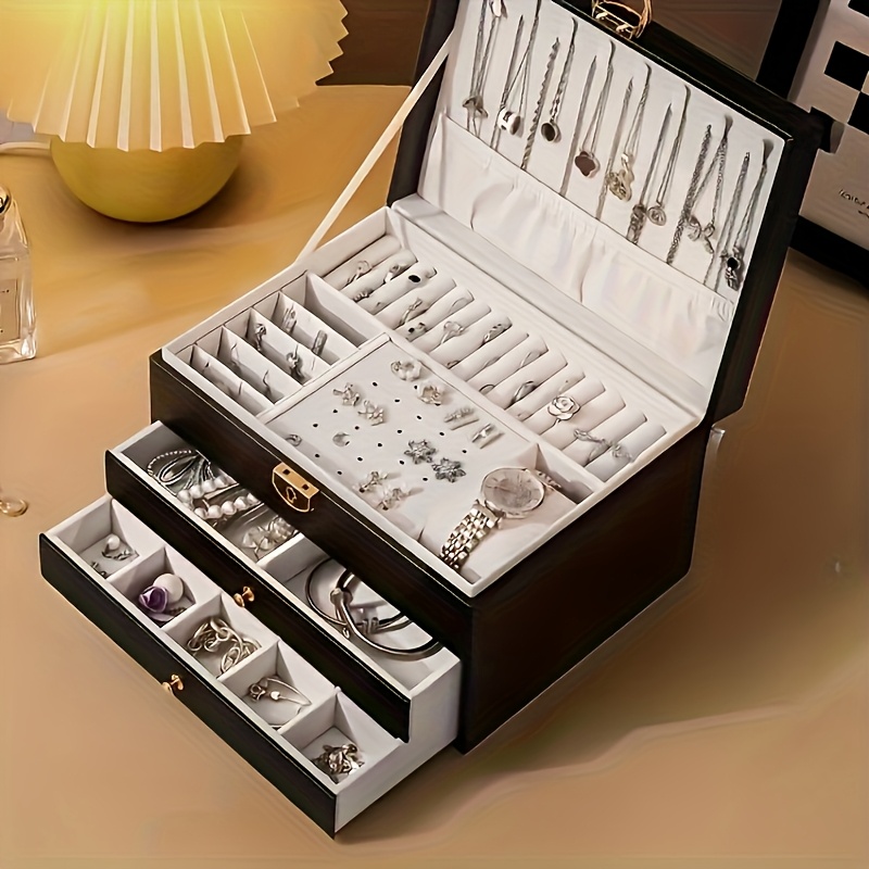 3 tier jewelry box organizer with key lock elegant green   lined compartments secure locking lid for earrings rings necklaces bracelets perfect gift for women home   decor durable synthetic   leather construction large jewelry box keepsake holder sophisticated design   leather   jewelry boxes Product details 4