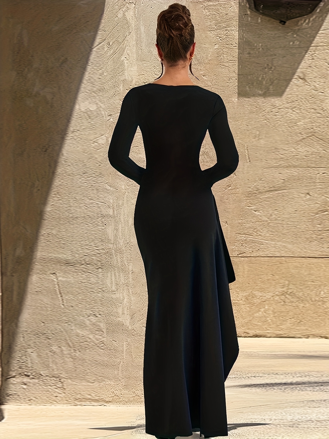 a beach body in an evening dress  The dress that arrives before you do. Slip into this off-shoulder mesh  maxi and feel the room shift. Every detaildraped neckline, sheer sleeves,  body-hugging silhouettemade for nights when you're the story