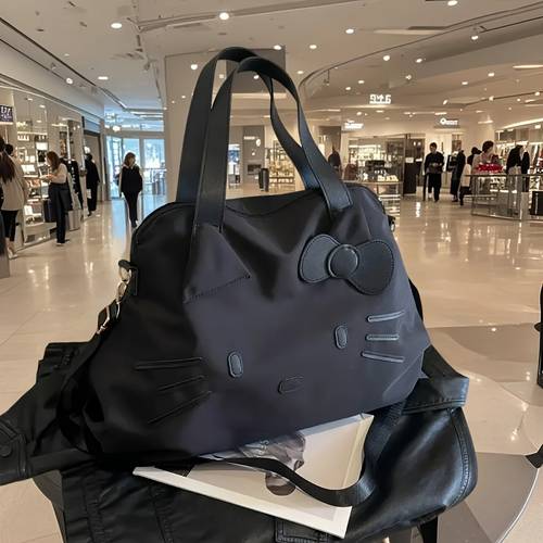 2025 new tote bag features a removable shoulder strap made from lightweight nylon tailored for women in a black and white palette with a zipper closure machine washable ideal for work commuting and travel