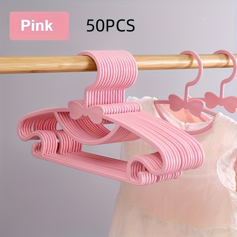 50pcs cute bow childrens childrens clothes hangers dual use wet dry durable plastic polished   for shower decor gifts polished   wet dry hanging hangers for childrens clothes