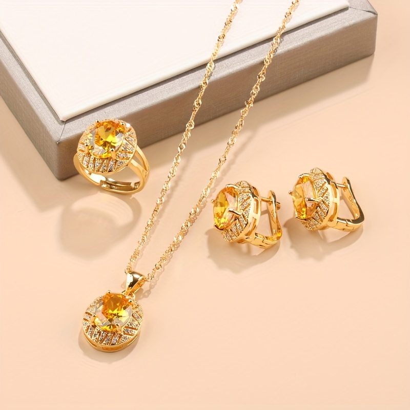 elegant 4 piece jewelry set 18k golden plated copper with synthetic zirconia stones french style necklace earrings and rings combo for daily wedding occasions christmas holiday theme   elegant accessory collection details 2