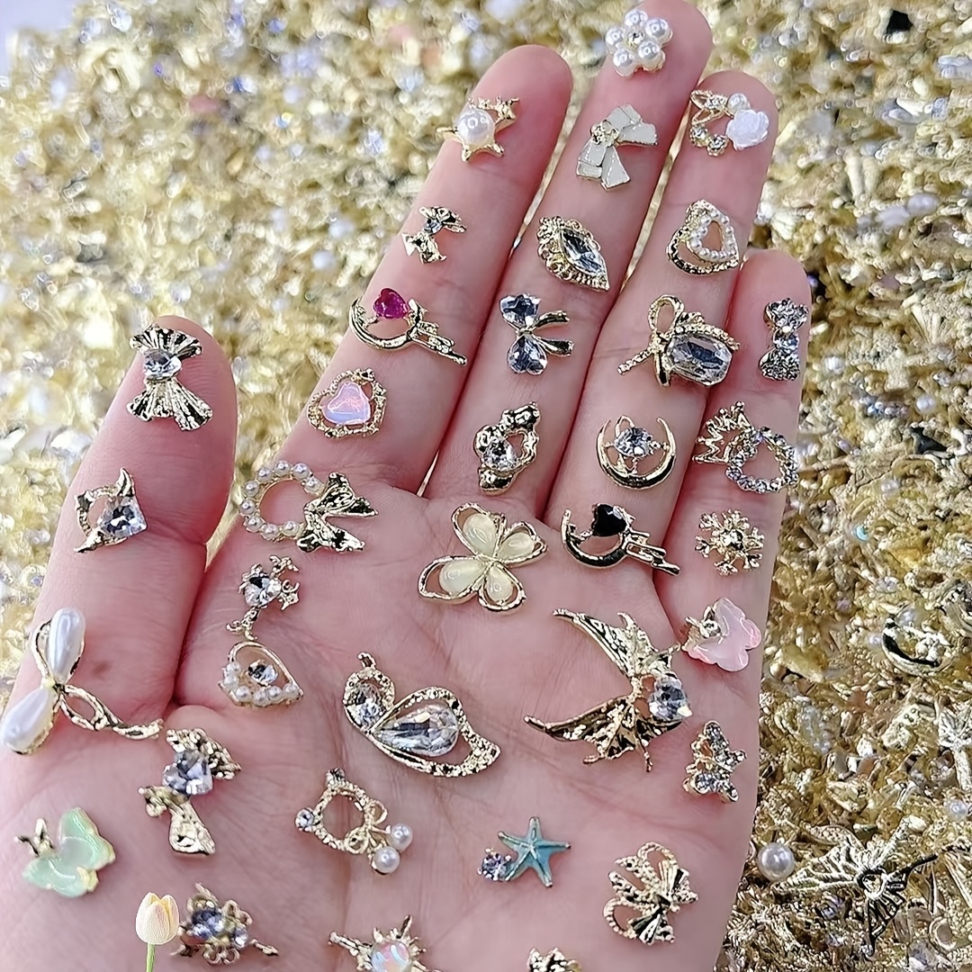 

Luxury Alloy Charm Set: 30pcs Collection, Set With Mica And Pearls, Assorted Golden Pendants, Suitable For Nail Art Design, Fragrance-free