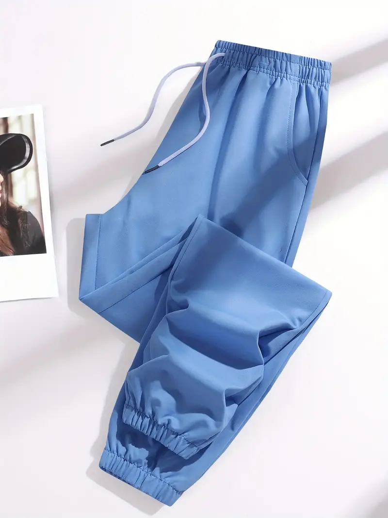 pantalon taille haute pour femme avec ceinture à cordon, tissu élastique, poches latérales et design froncé pour le camping et le port - noir, extérieur | pantalon à ceinture froncée | pantalon en tissu extensible Détails du produit 9