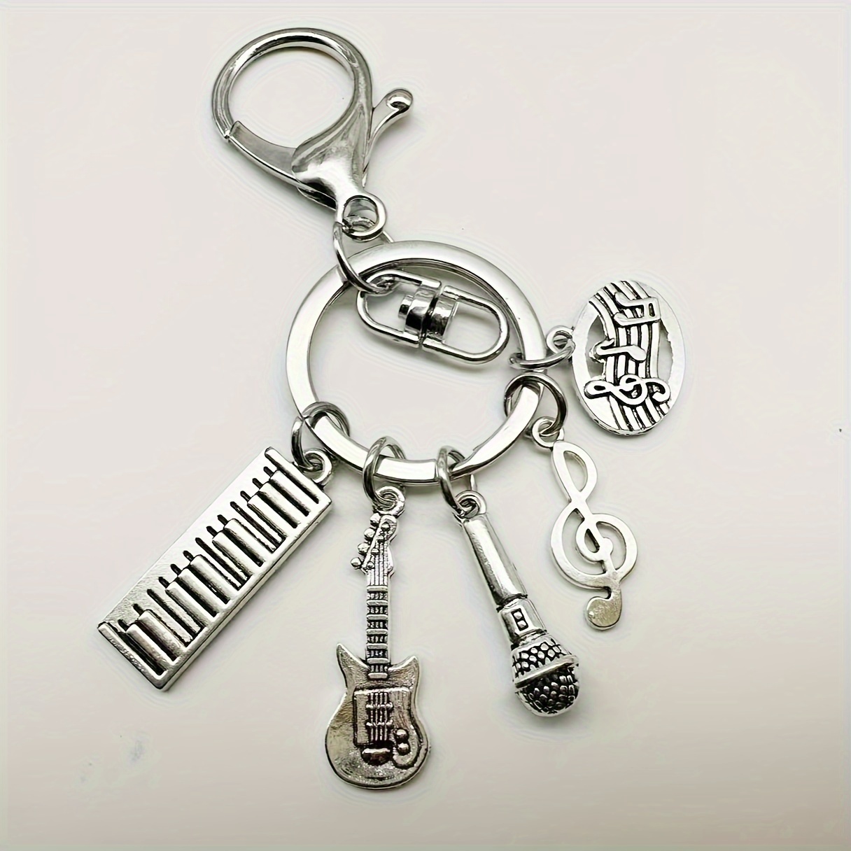 

Fashionable Music-themed Keychain, Guitar, , And Microphone Charms, Antique Silvery Iron Alloy Keyring, For Musicians And Music Lovers