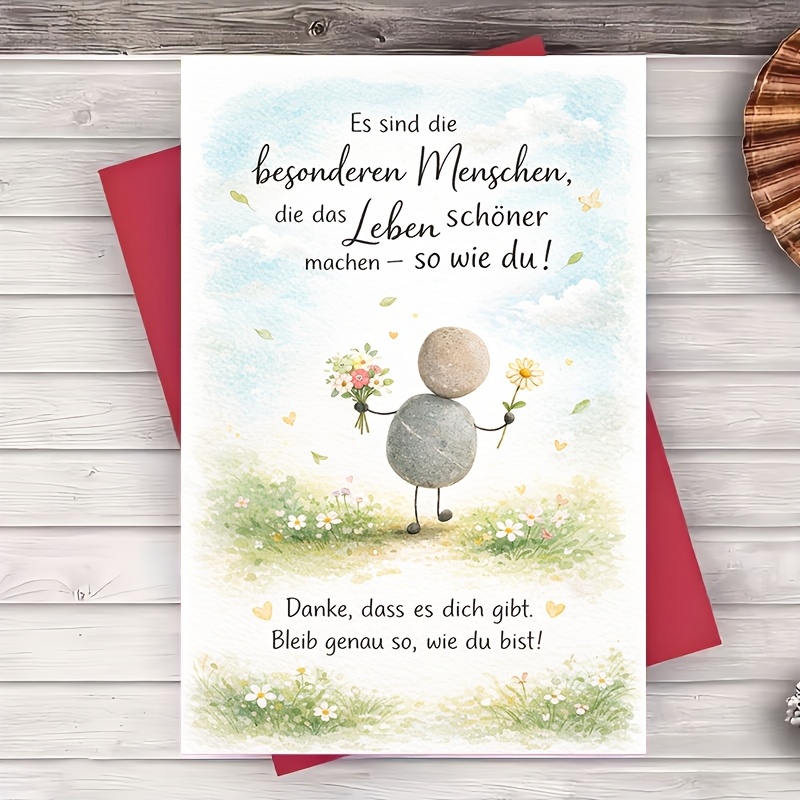 E-shop Ein Einzelnes Umschlag und eine Grußkarte mit einer ermutigenden Dankesnachricht, geschmückt mit einem charmanten Steincharakter und