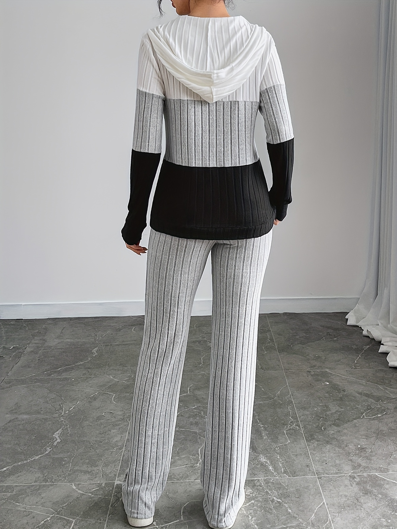 Close-up of the hooded top and patchwork detail, image 2