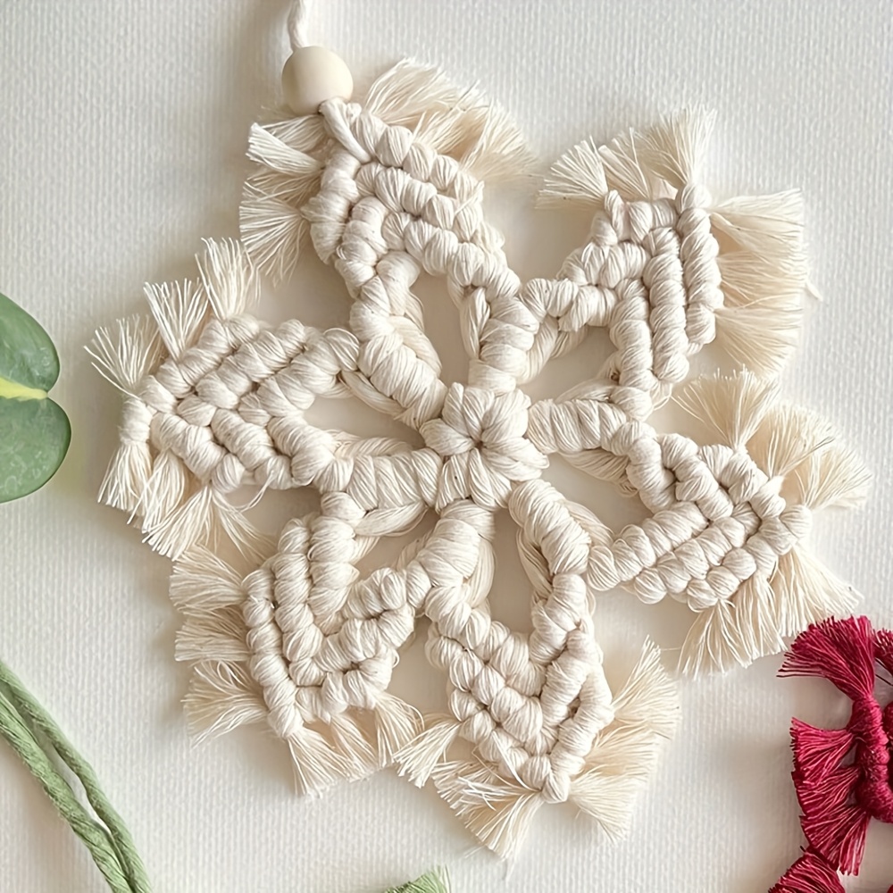 Image of A Finished Product Of A Christmas Tree Snowflake Ornament, A Macrame Wall Hanging In A Bohemian Style, Handcrafted With Colorful Tassels And Snowflake Stars