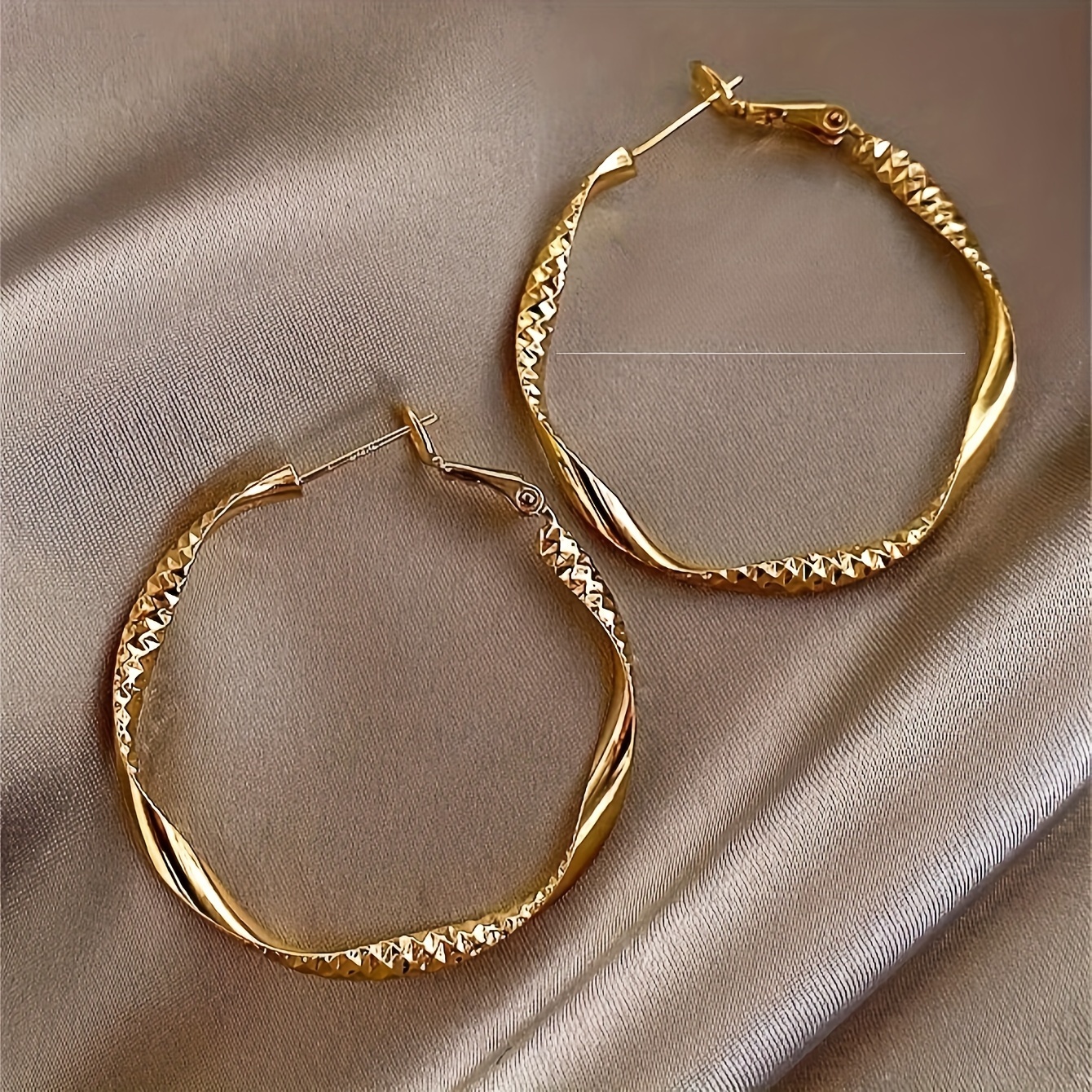 

Golden-tone Twisted Hoop Earrings For Women – Elegant Textured Design With Sparkling Accents, Alloy & Stainless Steel Posts, Casual Attire Or Parties, Quirky Earrings