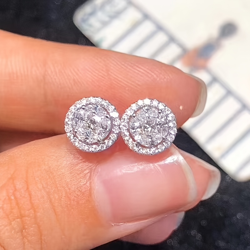 a pair of korean style instagram   wrap around ear studs niche and high end with a face effect versatile for daily commuting and featuring a gentle style