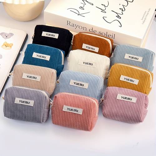eine weiche cordtasche, eine tragbare reise-make-up-tasche, eine multifunktionale aufbewahrungstasche, eine münzfach, geldbörse und eine kopfhörerhülle, die sich zu einem wundervollen kleinen geschenk verbinden.