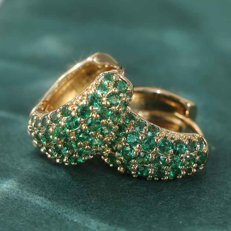 E-shop Großhandel Vintage-Stil Schmuckohrringe mit Clip für Damen, mit trendiger goldenen Farbe und synthetischem grünem Zirkonia