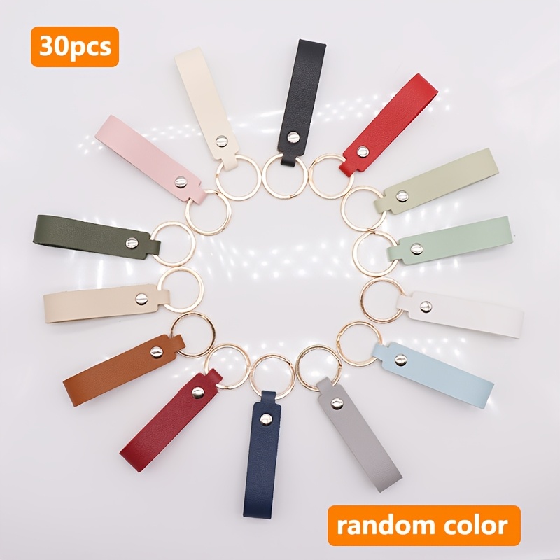 E-shop 30 Stk. Schlüsselanhänger aus Kunstleder mit Metallringen im Großhandel – Zufällige Farben (Beige, Pink, Rot, Marineblau, Grün, Grau, Schwarz, )
