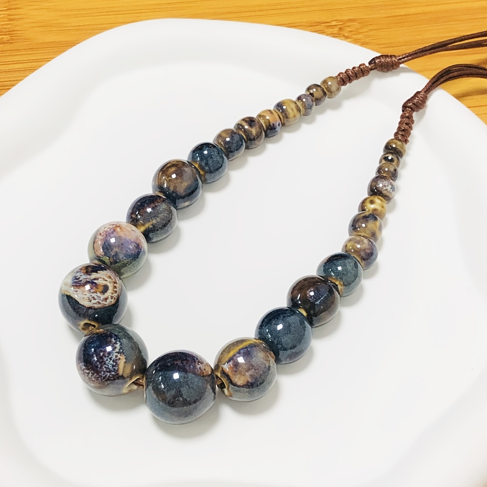 Image of Necklace Made Of Bohemian Ceramic Beads - A Porcelain Bead Chain That Rests On , Adjustable And Perfect As A Retro Ethnic Jewelry Gift For Everyday Use And Vacation Additions