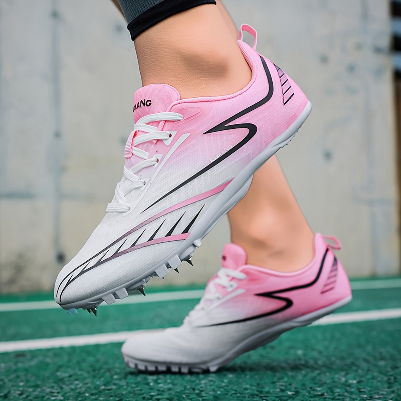 pink track cleats