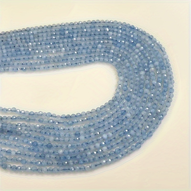 

à 115 pièces de perles naturelles d'aquamarine en 3/4 mm, adaptées pour la fabrication de bijoux DIY.