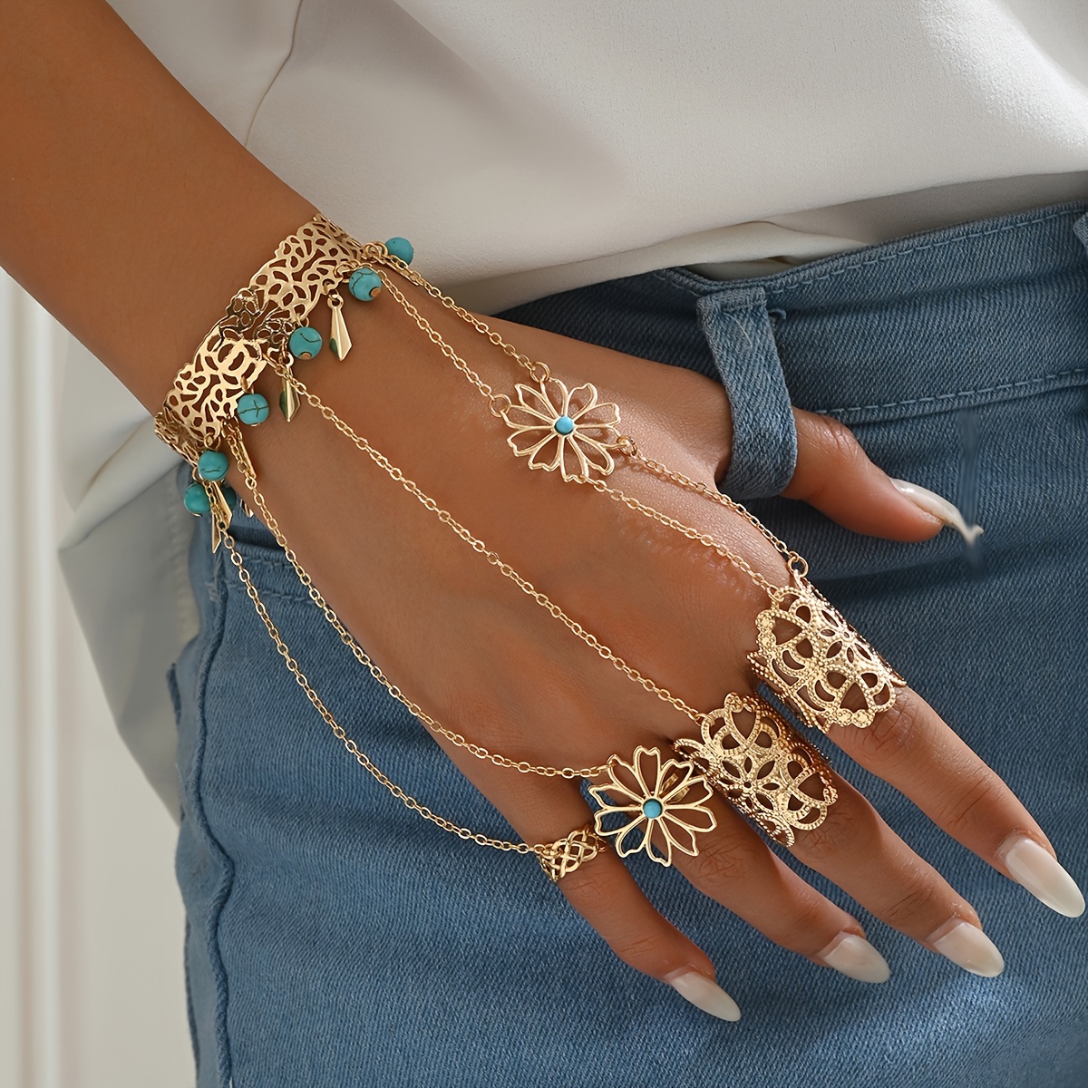 

-chic Golden Hollow Floral Finger Bracelet With Blue Turquoise Tassel - Alloy, Resin Inlay For Vacation & Party Wear