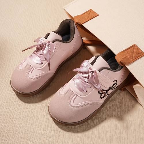 a pair of casual sneakers with designed for outdoor sports