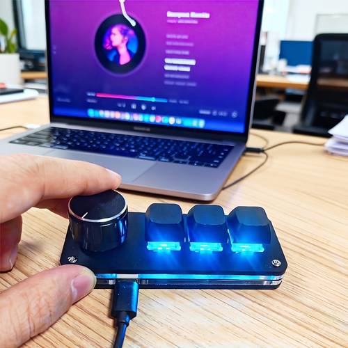 a mechanical keyboard with 3 or 4 keys featuring a compact and portable designed to save desk space and suitable for