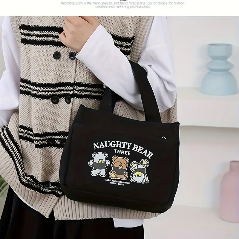 stylish minimalist tote bag with print lightweight zippered closure fixed shoulder straps cream white khaki black and casual casual tote bag material details 4