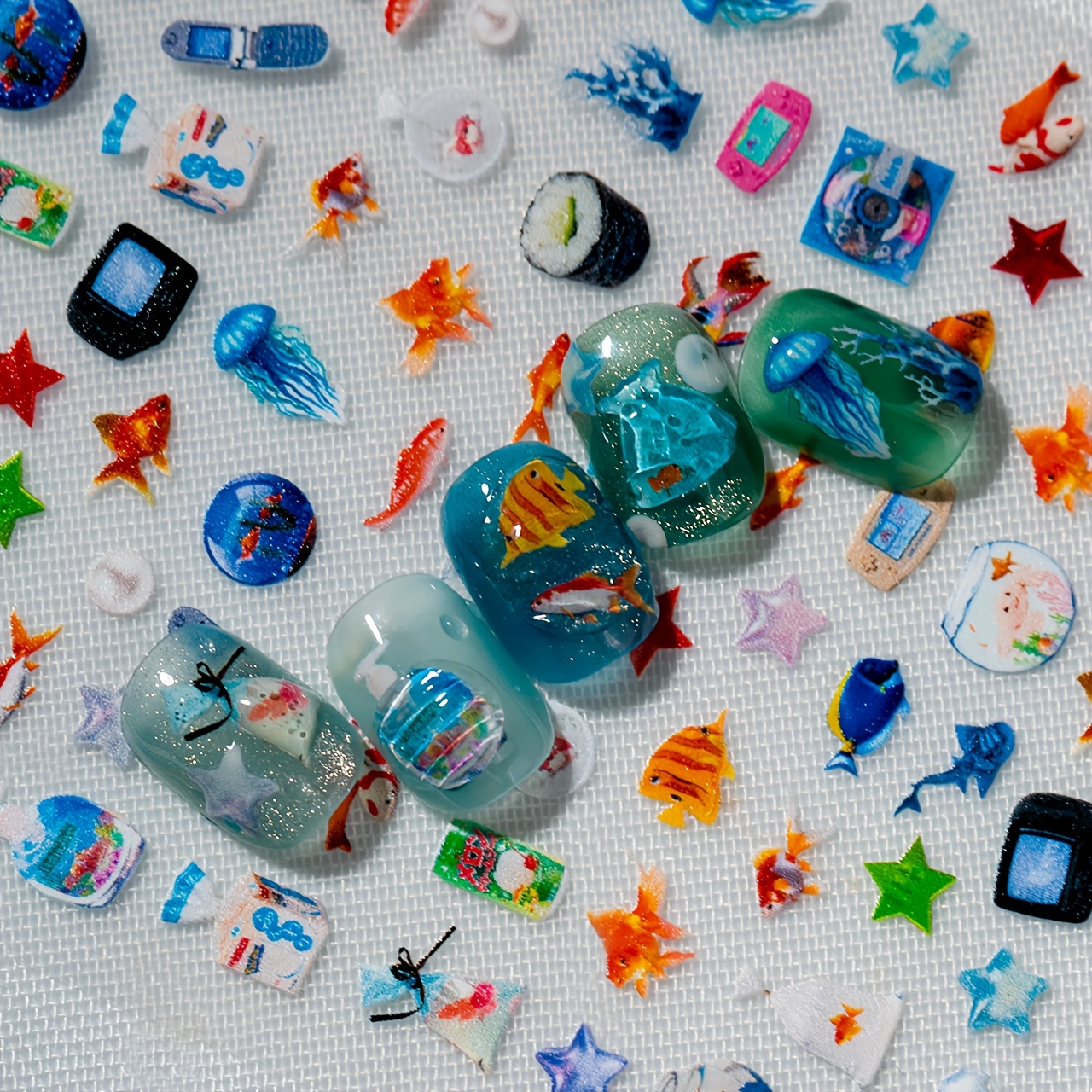 TEMU A Marine-themed Nail Sticker With Embossed Textures, Featuring Summer Elements Like Goldfish, Jellyfish, Beverage Cups, And Seashells. Perfect