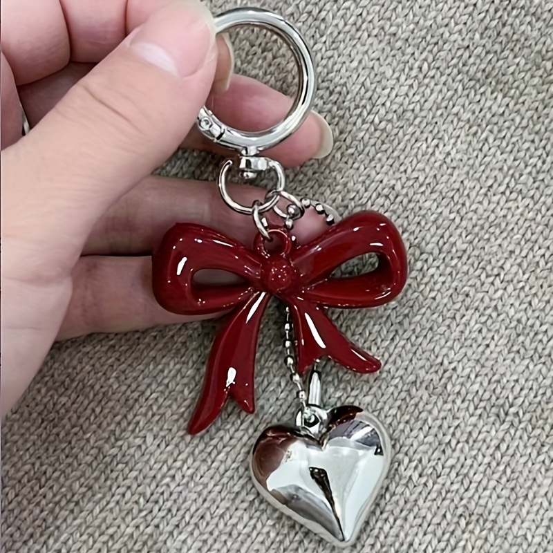 TEMU A New Unisex Keychain Featuring A Red Bow Heart Pendant, Stylish Bow Charm For Bags