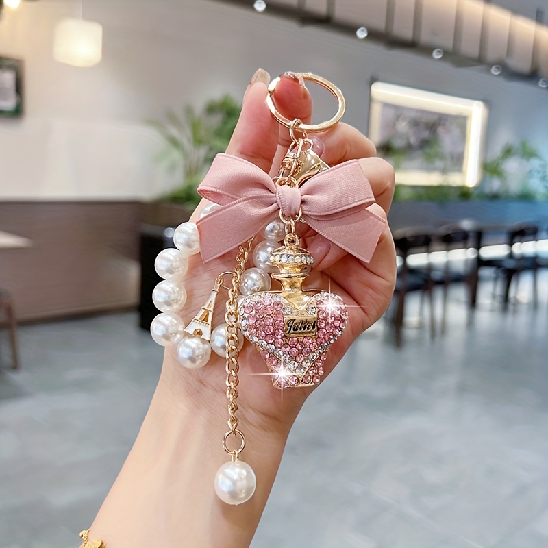TEMU Creative Water Bottle Keychain Fashionable Bow Perfume Bottle Bag Pendant Exquisite Pearl Chain Car Key Chain Ring Gift Additions