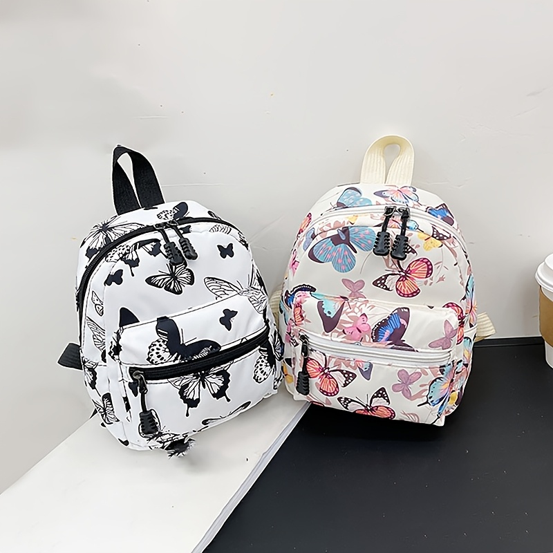 

Sac à dos imprimé vache de dessin mignon pour filles, sac d'école en toile nylon avec fermeture à glissière, doublure en polyester, lavable à - Blanc