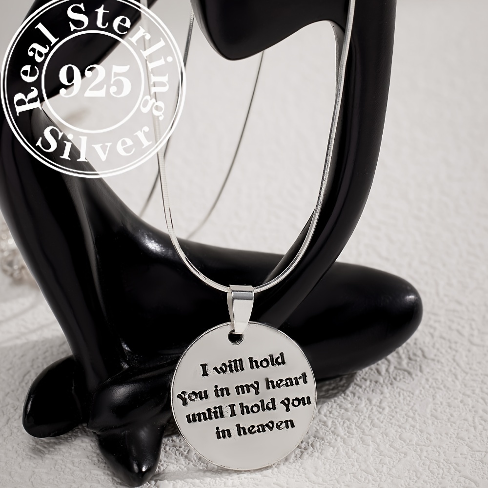 

A Silvery Snake Bone Chain With A Letter Round Pendant Is Suitable For By Women (approximately 7.3g).