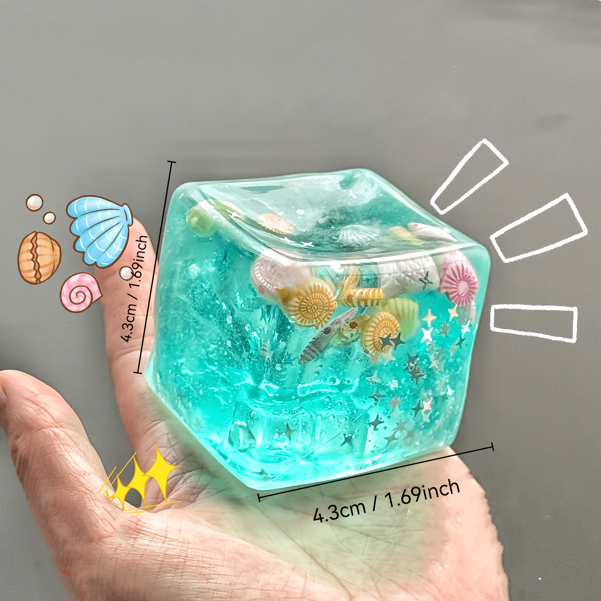     cube of ice   healing green jelly texture wrapped in shells   and other mini ocean gadgets soft fufu is like holding     of the deep sea in   of your hand decompression and healing
