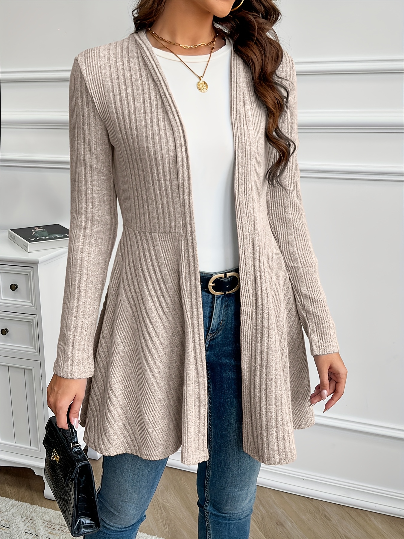 Full length front view of the cardigan on a hanger