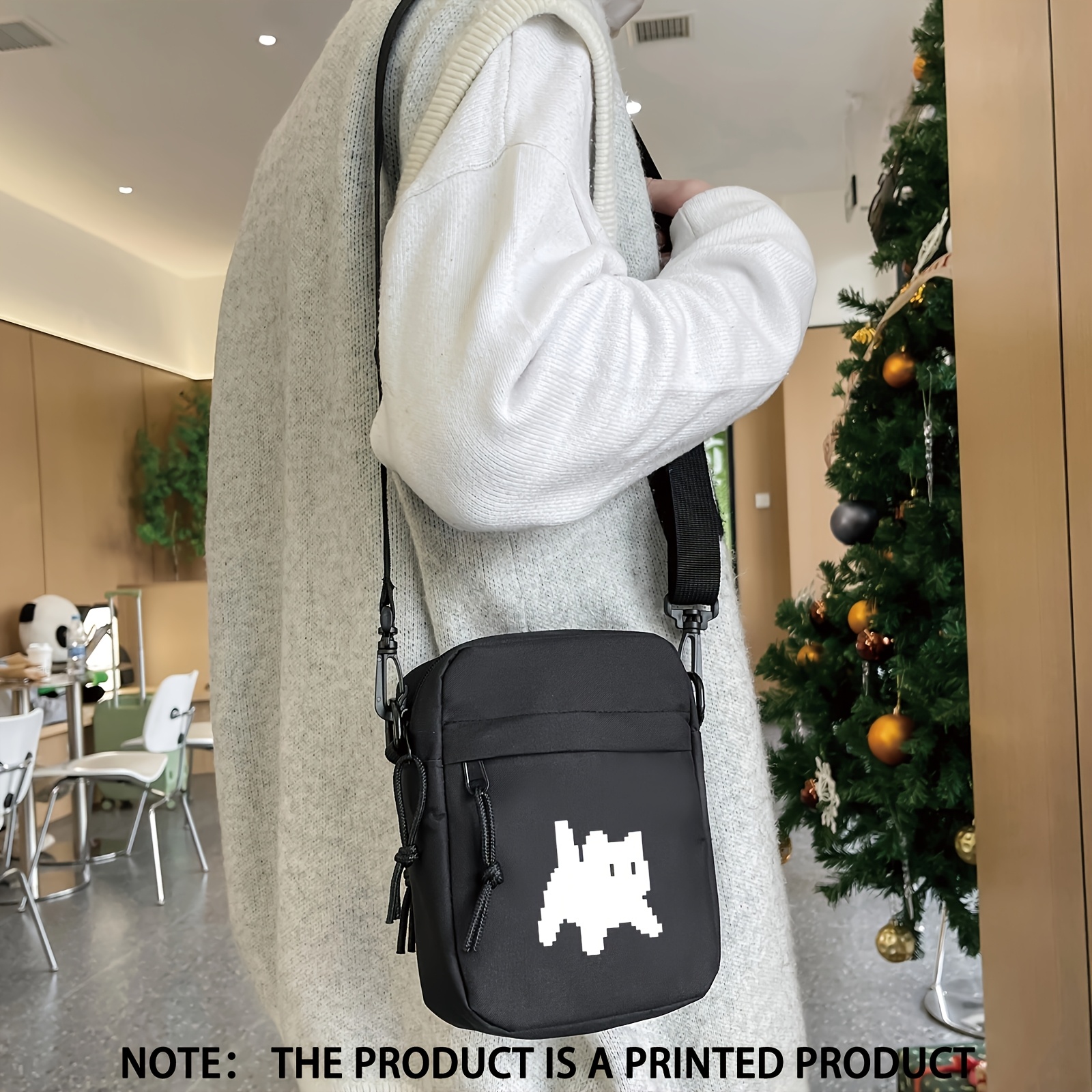 a stylish and minimalist black pixel cat pattern print trendy square bag suitable for   men and women   used as a crossbody or shoulder bag and is a convenient multifunctional phone bag