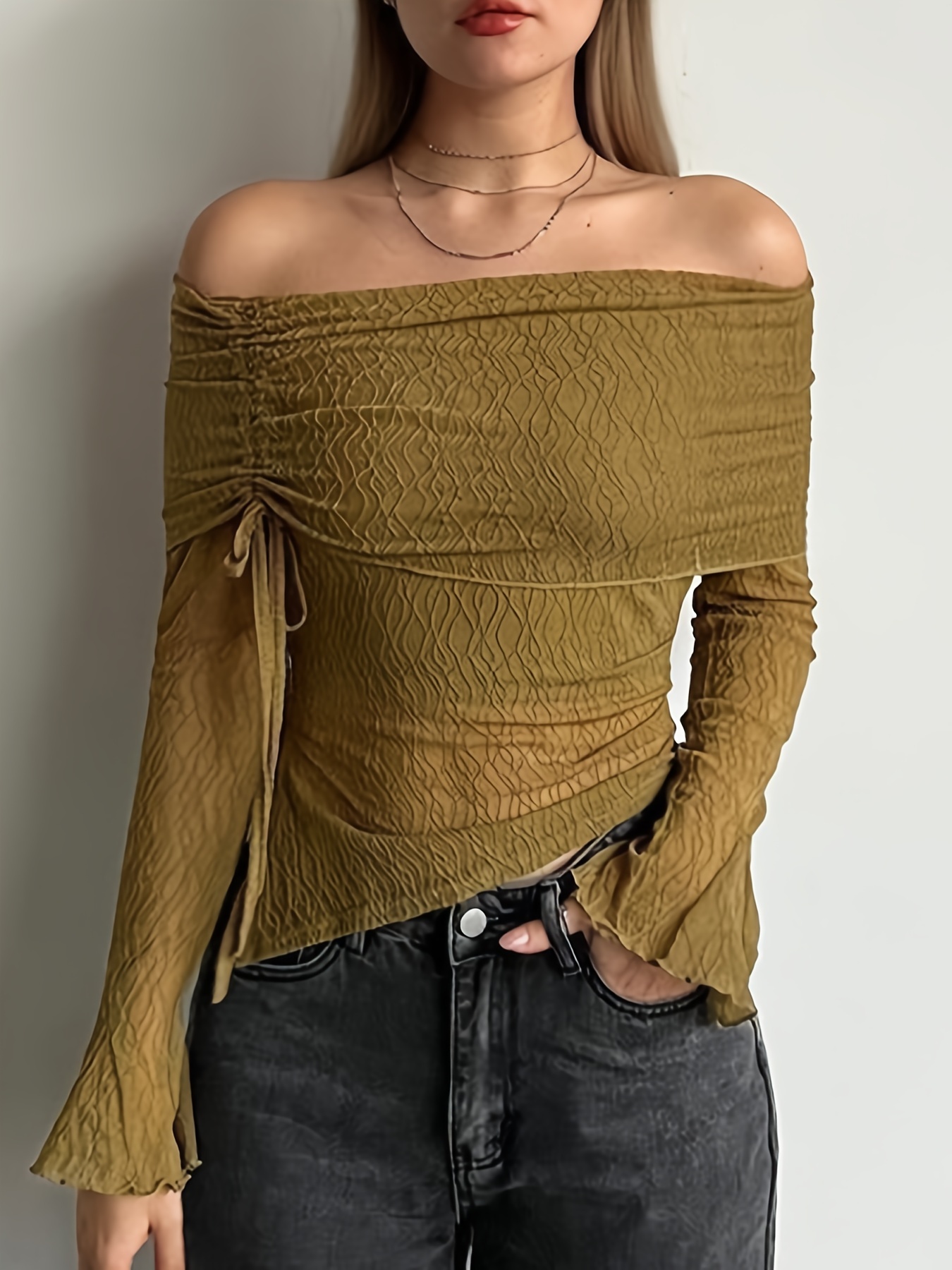 flare sleeve top sold on Temu United States