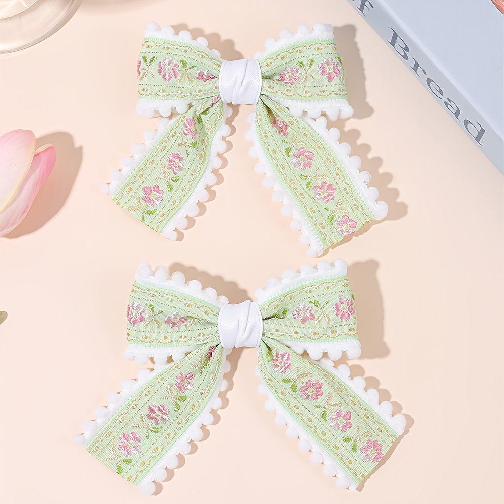 set 2 floral embroidered hair clips featuring bows - Temu Kuwait display picture 1