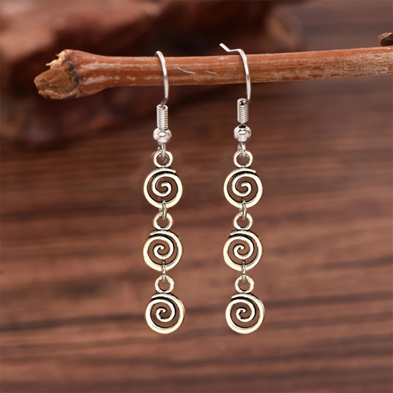 Image of A Pair Of Fashionable Vintage Spiral Earrings With Distressed Creative Mosquito Coil Pendant Swirl Long Tassel Ear Hooks. Suitable For Daily Wear, Parties, And Gifting