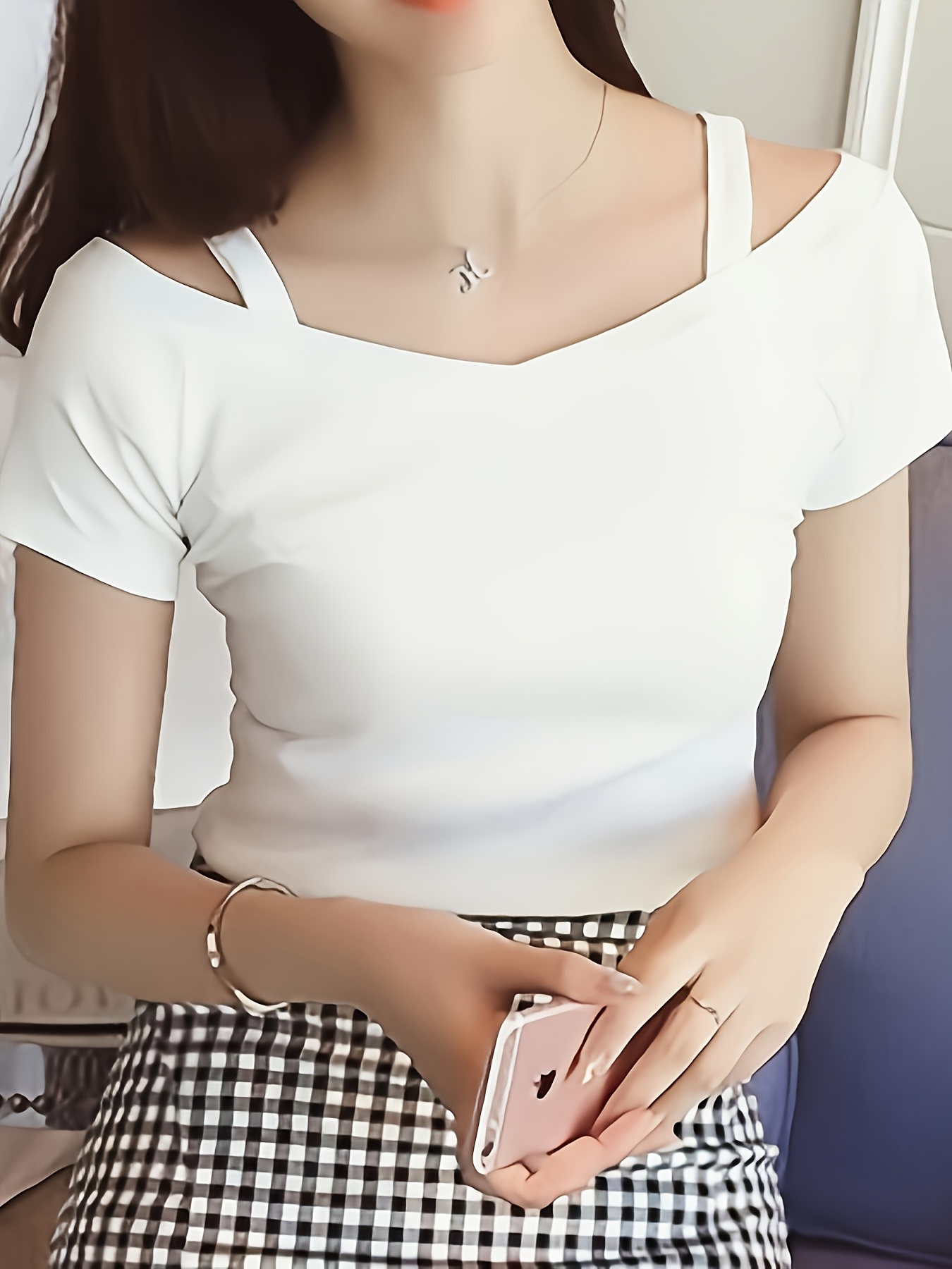 An Elegant Off-Shoulder Short-Sleeve T-Shirt, Perfect for Summer