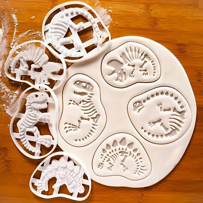 

dino-munch" 4-piece Dinosaur Fossil Cookie Cutter Set - 4 Unique Styles For Baking, Biscuits & Crafts - Durable Plastic