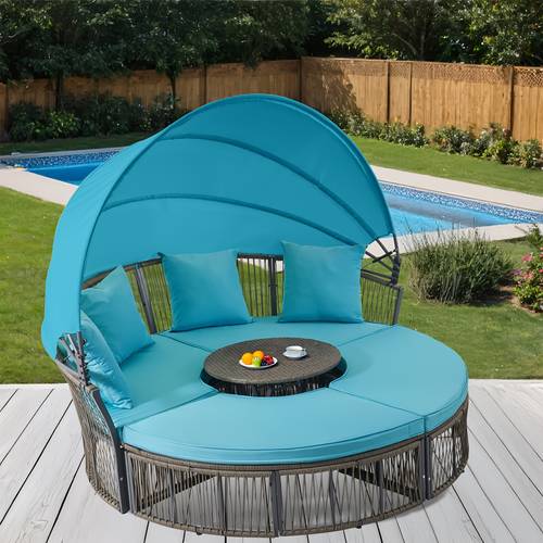 circular outdoor daybed featuring a retractable canopy and an adjustable table made of wicker rattan this patio sectional sofa waterproof cushions and pillows suitable for all weather gardens poolside