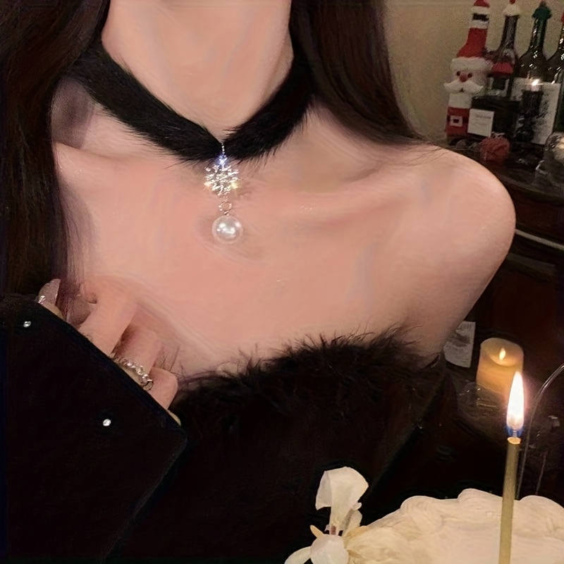 choker necklace made of soft velvet featuring a fluffy snowflake     parties and   Product details 0