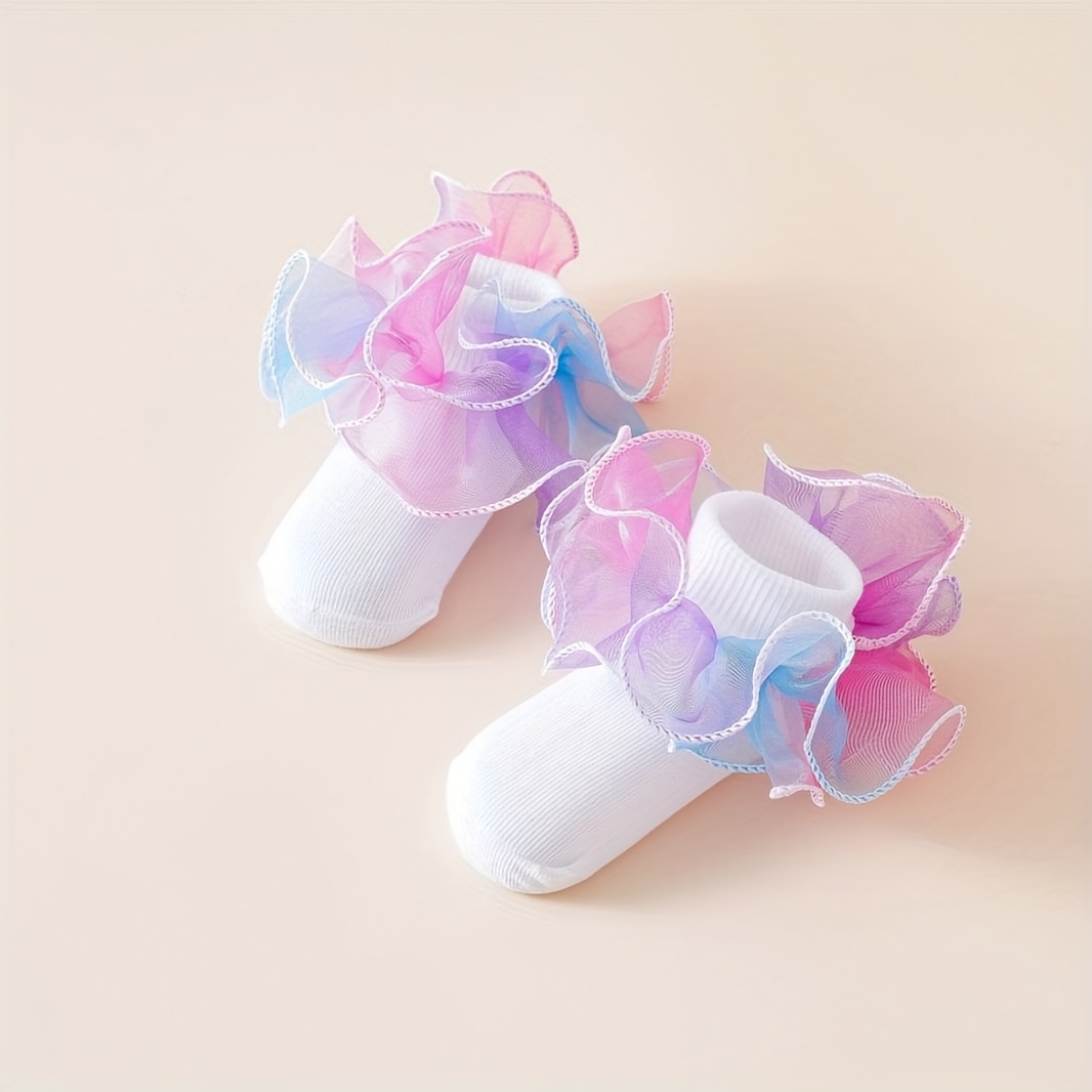 A Pair Of Socks For Girls Featuring Large Floral Lace, Designed For Princess Dance.