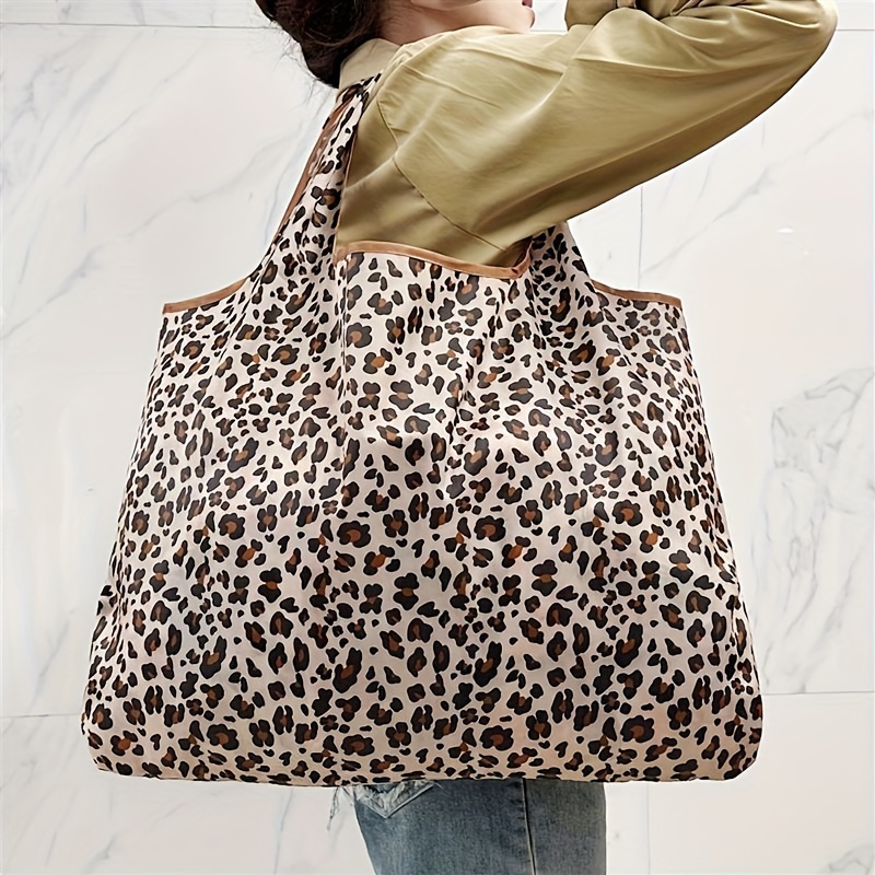 leopard print reusable shopping tote bag polyester leak proof square design with padded straps reinforced bottom for grocery   use details 6